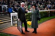 14 March 2024; Princess Anne, Princess Royal, speaks with trainer Willie Mullins, after he was presented with a framed print to mark his hundreth Cheltenham winner, on day three of the Cheltenham Racing Festival at Prestbury Park in Cheltenham, England. Photo by Harry Murphy/Sportsfile