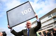 14 March 2024; Trainer Willie Mullins after he was presented with a framed print to mark his hundreth Cheltenham winner on day three of the Cheltenham Racing Festival at Prestbury Park in Cheltenham, England. Photo by Harry Murphy/Sportsfile