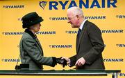 14 March 2024; Princess Anne, Princess Royal, presents trainer Willie Mullins with a framed print to mark his hundreth Cheltenham winner on day three of the Cheltenham Racing Festival at Prestbury Park in Cheltenham, England. Photo by Harry Murphy/Sportsfile