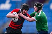 14 March 2024; TJ Kennedy of Colaiste Chill Mhantain is tackled by John Casey of Coláiste Mhuire CBS, Mullingar, during the Bank of Ireland McMullen Cup final match between Coláiste Mhuire CBS, Mullingar and Colaiste Chill Mhantain at Energia Park in Dublin. Photo by Ben McShane/Sportsfile