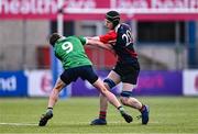 14 March 2024; Conor Kelly of Colaiste Chill Mhantain evades the tackle of James Flynn of Coláiste Mhuire CBS, Mullingar, during the Bank of Ireland McMullen Cup final match between Coláiste Mhuire CBS, Mullingar and Colaiste Chill Mhantain at Energia Park in Dublin. Photo by Ben McShane/Sportsfile