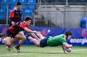 14 March 2024; John Casey of Coláiste Mhuire CBS, Mullingar, scores his side's second try during the Bank of Ireland McMullen Cup final match between Coláiste Mhuire CBS, Mullingar and Colaiste Chill Mhantain at Energia Park in Dublin. Photo by Ben McShane/Sportsfile