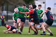 14 March 2024; Eoin Conlon of Coláiste Mhuire CBS, Mullingar, is tackled by Ricardo Whelan of Colaiste Chill Mhantain during the Bank of Ireland McMullen Cup final match between Coláiste Mhuire CBS, Mullingar and Colaiste Chill Mhantain at Energia Park in Dublin. Photo by Ben McShane/Sportsfile