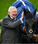 14 March 2024; Joint owner Sir Alex Ferguson celebrates with Monmiral after victory in the Pertemps Handicap Hurdle on day three of the Cheltenham Racing Festival at Prestbury Park in Cheltenham, England. Photo by David Fitzgerald/Sportsfile