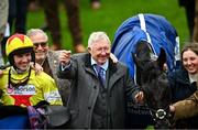 14 March 2024; Jockey Harry Cobden and joint ownerr Sir Alex Ferguson celebrate with winning connections after Monmiral won the Pertemps Handicap Hurdle on day three of the Cheltenham Racing Festival at Prestbury Park in Cheltenham, England. Photo by David Fitzgerald/Sportsfile