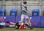 14 March 2024; Luke O'Shea of CUS scores his side's second try during the Bank of Ireland Father Godfrey Cup final match between CUS and St Gerard's School at Energia Park in Dublin. Photo by Ben McShane/Sportsfile