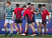 14 March 2024; Luke O'Shea of CUS, centre, celebrates with teammates after scoring their side's second try during the Bank of Ireland Father Godfrey Cup final match between CUS and St Gerard's School at Energia Park in Dublin. Photo by Ben McShane/Sportsfile