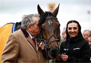 14 March 2024; Joint owner John Hales kisses Protektorat after victory in the Ryanair Chase on day three of the Cheltenham Racing Festival at Prestbury Park in Cheltenham, England. Photo by Harry Murphy/Sportsfile
