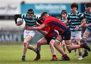 14 March 2024; Noah O'Neill of St Gerard's School is tackled by Connell Ryan of CUS during the Bank of Ireland Father Godfrey Cup final match between CUS and St Gerard's School at Energia Park in Dublin. Photo by Ben McShane/Sportsfile