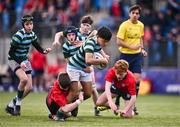14 March 2024; Oscar He of St Gerard's School is tackled by Louis Murphy of CUS during the Bank of Ireland Father Godfrey Cup final match between CUS and St Gerard's School at Energia Park in Dublin. Photo by Ben McShane/Sportsfile