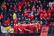 14 March 2024; CUS players huddle during the Bank of Ireland Father Godfrey Cup final match between CUS and St Gerard's School at Energia Park in Dublin. Photo by Ben McShane/Sportsfile
