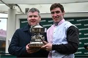 14 March 2024; Jockey Jack Kennedy, right, and trainer Gordon Elliott celebrate with the trophy after winning the Paddy Power Stayers' Hurdle with Teahupooto during day three of the Cheltenham Racing Festival at Prestbury Park in Cheltenham, England. Photo by Harry Murphy/Sportsfile