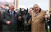 14 March 2024; Joint owners Sir Alex Ferguson, left, and John Hales celebrate with Monmiral after victory in the Pertemps Handicap Hurdle on day three of the Cheltenham Racing Festival at Prestbury Park in Cheltenham, England. Photo by Harry Murphy/Sportsfile