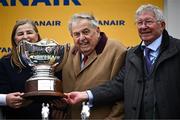 14 March 2024; Joint owners John Hales, left, and Sir Alex Ferguson celebrate with the trophy after sending out Protektorat to win the Ryanair Chase on day three of the Cheltenham Racing Festival at Prestbury Park in Cheltenham, England. Photo by Harry Murphy/Sportsfile