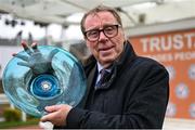14 March 2024; Owner Harry Redknapp celebrates with the plate after sending out Shakem Up'Arry to win the TrustATrader Plate Handicap Chase on day three of the Cheltenham Racing Festival at Prestbury Park in Cheltenham, England. Photo by David Fitzgerald/Sportsfile