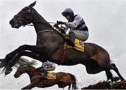 14 March 2024; Majestic Force, with Darragh O'Keeffe up, left, jump the last, first time round, on their way to finishing fifth in the Ryanair Mares' Novices' Hurdle on day three of the Cheltenham Racing Festival at Prestbury Park in Cheltenham, England. Photo by Harry Murphy/Sportsfile
