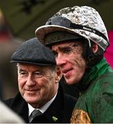 14 March 2024; Jockey Derek O'Connor celebrates with owner JP McManus after winning connections after winning the Kim Muir Handicap Chase on Inothewayurthinkin during day three of the Cheltenham Racing Festival at Prestbury Park in Cheltenham, England. Harry Murphy/Sportsfile