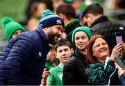 15 March 2024; Ireland head coach Andy Farrell poses for a selfie with supporters during an Ireland rugby captain's run at the Aviva Stadium in Dublin. Photo by Sam Barnes/Sportsfile