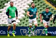 15 March 2024; Ireland players, from left, Tadhg Beirne, Jack Conan and Tadhg Furlong during an Ireland rugby captain's run at the Aviva Stadium in Dublin. Photo by Sam Barnes/Sportsfile