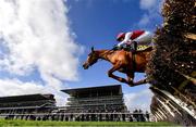 15 March 2024; Fratas, with Darragh O'Keeffe up, jumps a fence during the JCB Triumph Hurdle on day four of the Cheltenham Racing Festival at Prestbury Park in Cheltenham, England. Photo by David Fitzgerald/Sportsfile