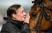 15 March 2024; Groom Emilie Seigle celebrates with Absurde after winning the BetMGM County Handicap Hurdle, with Paul Townend up, on day four of the Cheltenham Racing Festival at Prestbury Park in Cheltenham, England. Photo by David Fitzgerald/Sportsfile