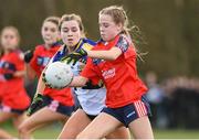 15 March 2024; Roisin Ni Liathain of St Marys in action against Rachel Gallagher of Ballinrobe Community School during the Lidl All-Ireland Post Primary School Junior C Championship final match between St Marys, Macroom, Cork and Ballinrobe Community School, Mayo at the University of Limerick. Photo by Matt Browne/Sportsfile