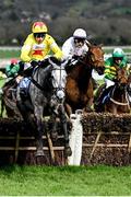15 March 2024; L'Eau Du Sud, with Harry Skelton up, left, on their way to finishing second, ahead of eventual winner Absurde, with Paul Townend up, during the the BetMGM County Handicap Hurdle on day four of the Cheltenham Racing Festival at Prestbury Park in Cheltenham, England. Photo by David Fitzgerald/Sportsfile