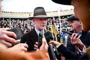 15 March 2024; Trainer Willie Mullins is interviewed after Paul Townend won the Boodles Cheltenham Gold Cup Chase aboard Galopin Des Champs on day four of the Cheltenham Racing Festival at Prestbury Park in Cheltenham, England. Photo by Harry Murphy/Sportsfile