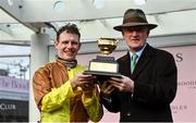 15 March 2024; Jockey Paul Townend and trainer Willie Mullins celebrate with the Gold Cup after winning the Boodles Cheltenham Gold Cup Chase with Galopin Des Champs on day four of the Cheltenham Racing Festival at Prestbury Park in Cheltenham, England. Photo by David Fitzgerald/Sportsfile