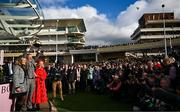 15 March 2024; Owner Audrey Turley, right, celebrates with winning connections after sending out Galopin Des Champs to win the Boodles Cheltenham Gold Cup Chase with Paul Townend up, on day four of the Cheltenham Racing Festival at Prestbury Park in Cheltenham, England. Photo by Harry Murphy/Sportsfile