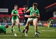 15 March 2024; Hugo McLaughlin of Ireland scores his side's first try despite the tackle of Jerry Blyth-Lafferty of Scotland during the U20 Six Nations Rugby Championship match between Ireland and Scotland at Virgin Media Park in Cork. Photo by Brendan Moran/Sportsfile