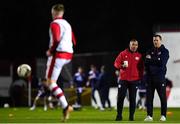 15 March 2024; St Patrick's Athletic manager Jon Daly, right, and assistant manager Seán O'Connor look on as players warm up before the SSE Airtricity Men's Premier Division match between St Patrick's Athletic and Shelbourne at Richmond Park in Dublin. Photo by Shauna Clinton/Sportsfile