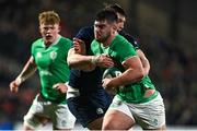 15 March 2024; Jacob Boyd of Ireland is tackled by Callum Norrie of Scotland during the U20 Six Nations Rugby Championship match between Ireland and Scotland at Virgin Media Park in Cork. Photo by Brendan Moran/Sportsfile