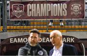 15 March 2024; A champions banner in the stand behind Shamrock Rovers manager Stephen Bradley, left, and Galway manager John Caulfield before the SSE Airtricity Men's Premier Division match between Galway United and Shamrock Rovers at Eamonn Deacy Park in Galway. Photo by Piaras Ó Mídheach/Sportsfile
