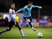 15 March 2024; Connor Parsons of Waterford in action against Ciaran McGuckin of Dundalk during the SSE Airtricity Men's Premier Division match between Dundalk and Waterford at Oriel Park in Dundalk, Louth. Photo by Ramsey Cardy/Sportsfile