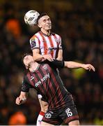 15 March 2024; Jordan McEneff of Derry City in action against James Clarke of Bohemians during the SSE Airtricity Men's Premier Division match between Bohemians and Derry City at Dalymount Park in Dublin. Photo by Stephen McCarthy/Sportsfile