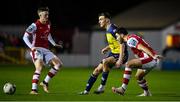 15 March 2024; Sean Boyd of Shelbourne in action against St Patrick's Athletic players Chris Forrester, left, and Luke Turner during the SSE Airtricity Men's Premier Division match between St Patrick's Athletic and Shelbourne at Richmond Park in Dublin. Photo by Seb Daly/Sportsfile
