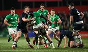 15 March 2024; Sean Edogbo of Ireland is tackled by Euan McVie and Callum Norrie of Scotland during the U20 Six Nations Rugby Championship match between Ireland and Scotland at Virgin Media Park in Cork. Photo by Brendan Moran/Sportsfile