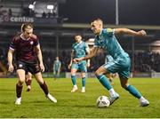 15 March 2024; Graham Burke of Shamrock Rovers in action against David Hurley of Galway United during the SSE Airtricity Men's Premier Division match between Galway United and Shamrock Rovers at Eamonn Deacy Park in Galway. Photo by Piaras Ó Mídheach/Sportsfile