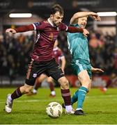 15 March 2024; Rory Gaffney of Shamrock Rovers in action against Conor O'Keeffe of Galway United during the SSE Airtricity Men's Premier Division match between Galway United and Shamrock Rovers at Eamonn Deacy Park in Galway. Photo by Piaras Ó Mídheach/Sportsfile