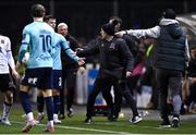 15 March 2024; Dundalk assistant manager Patrick Cregg clashes with Ryan Burke of Waterford, for which he was shown a red card, during the SSE Airtricity Men's Premier Division match between Dundalk and Waterford at Oriel Park in Dundalk, Louth. Photo by Ramsey Cardy/Sportsfile