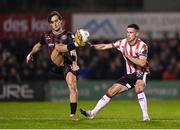 15 March 2024; Dylan Connolly of Bohemians in action against Jordan McEneff of Derry City during the SSE Airtricity Men's Premier Division match between Bohemians and Derry City at Dalymount Park in Dublin. Photo by Stephen McCarthy/Sportsfile