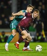 15 March 2024; Stephen Walsh of Galway United in action against Lee Grace of Shamrock Rovers during the SSE Airtricity Men's Premier Division match between Galway United and Shamrock Rovers at Eamonn Deacy Park in Galway. Photo by Piaras Ó Mídheach/Sportsfile