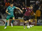 15 March 2024; Conor O'Keeffe of Galway United in action against Markus Poom of Shamrock Rovers during the SSE Airtricity Men's Premier Division match between Galway United and Shamrock Rovers at Eamonn Deacy Park in Galway. Photo by Piaras Ó Mídheach/Sportsfile