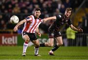 15 March 2024; Patrick Hoban of Derry City in action against Jevon Mills of Bohemians during the SSE Airtricity Men's Premier Division match between Bohemians and Derry City at Dalymount Park in Dublin. Photo by Stephen McCarthy/Sportsfile