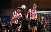 15 March 2024; Cameron McJannet, left, and Ronan Boyce of Derry City in action against James Akintunde of Bohemians during the SSE Airtricity Men's Premier Division match between Bohemians and Derry City at Dalymount Park in Dublin. Photo by Stephen McCarthy/Sportsfile