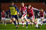 15 March 2024; Kian Leavy of St Patrick's Athletic in action against Seán Gannon of Shelbourne during the SSE Airtricity Men's Premier Division match between St Patrick's Athletic and Shelbourne at Richmond Park in Dublin. Photo by Shauna Clinton/Sportsfile