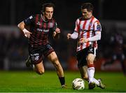 15 March 2024; Dylan Connolly of Bohemians in action against Ciarán Coll of Derry City during the SSE Airtricity Men's Premier Division match between Bohemians and Derry City at Dalymount Park in Dublin. Photo by Tyler Miller/Sportsfile