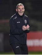 15 March 2024; Bohemians first team coach Derek Pender celebrates at the full time whistle of the SSE Airtricity Men's Premier Division match between Bohemians and Derry City at Dalymount Park in Dublin. Photo by Stephen McCarthy/Sportsfile