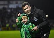 15 March 2024; Shamrock Rovers manager Stephen Bradley celebrates with supporter Mason Byrne after victory in the SSE Airtricity Men's Premier Division match between Galway United and Shamrock Rovers at Eamonn Deacy Park in Galway. Photo by Piaras Ó Mídheach/Sportsfile